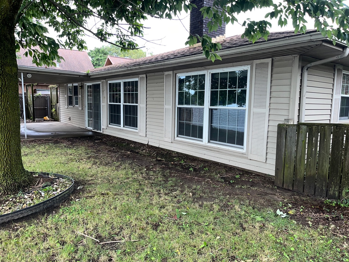 2 Beachcomber Place Pekin, IL 61554 - Photo 4 of 4 a front view of a house with garden