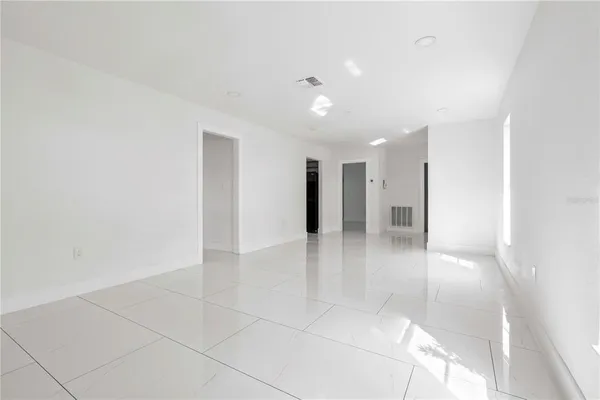 a view of a hallway with a bathroom