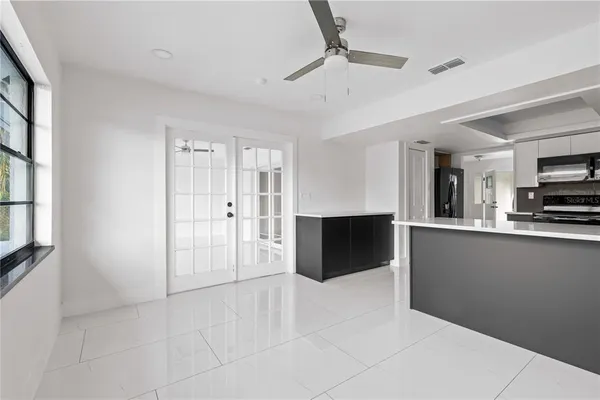 a view of an empty room with a window