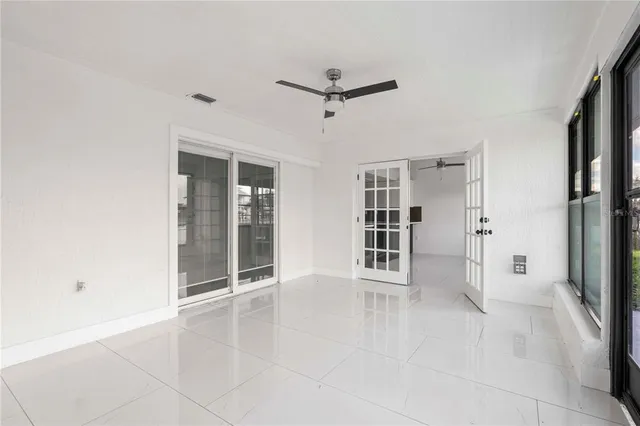 a view of an entryway with a floor to ceiling window