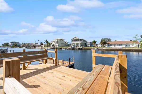 a view of a terrace with a lake view
