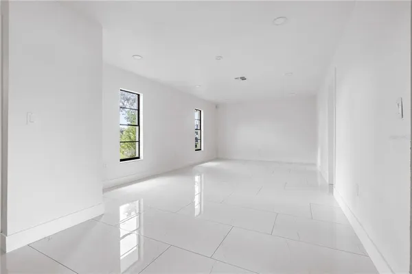 an empty room with windows