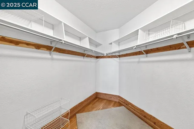 a view of a room with racks on the wall