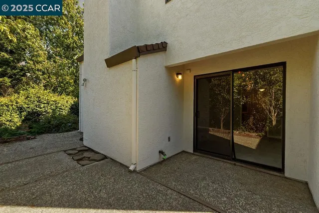 a view of a stairs and an entryway