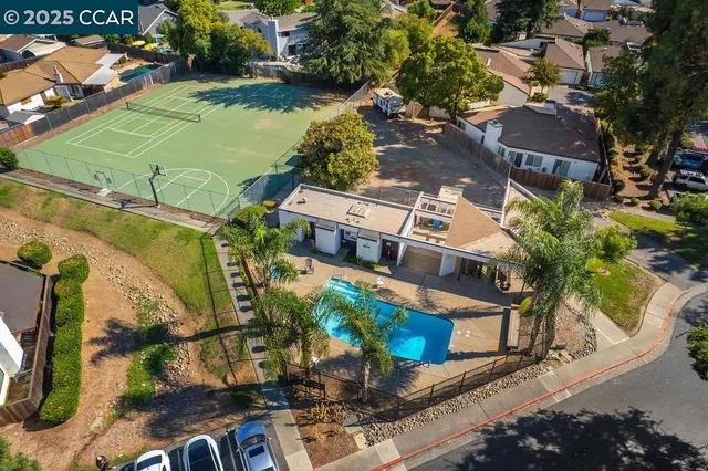 an aerial view of a house with a garden