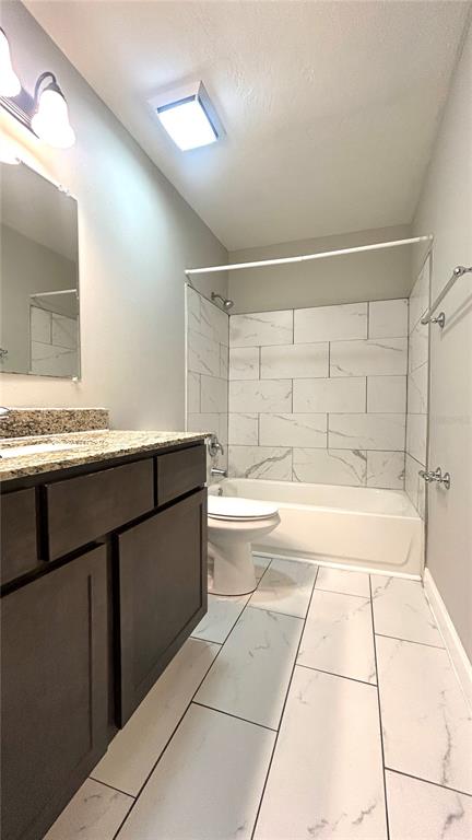 5324 Southwest 88 Court Gainesville, FL 32608 - Photo 12 of 21 a spacious bathroom with a granite countertop sink a mirror and a bathtub