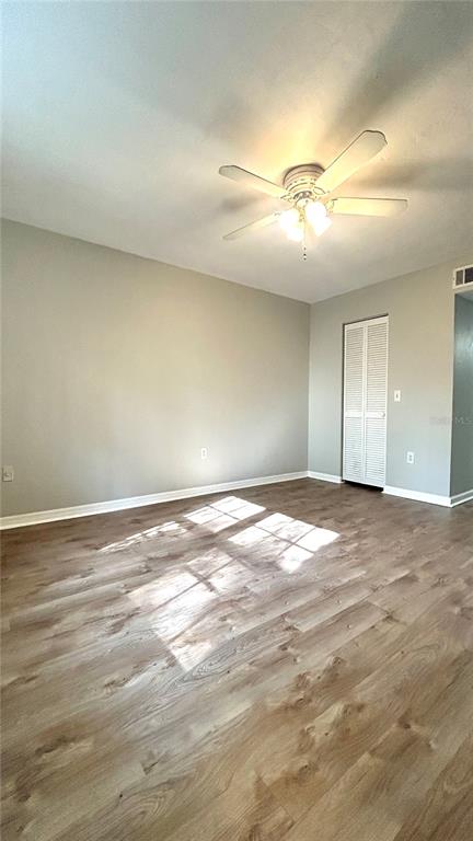 5324 Southwest 88 Court Gainesville, FL 32608 - Photo 14 of 21 a view of empty room with wooden floor