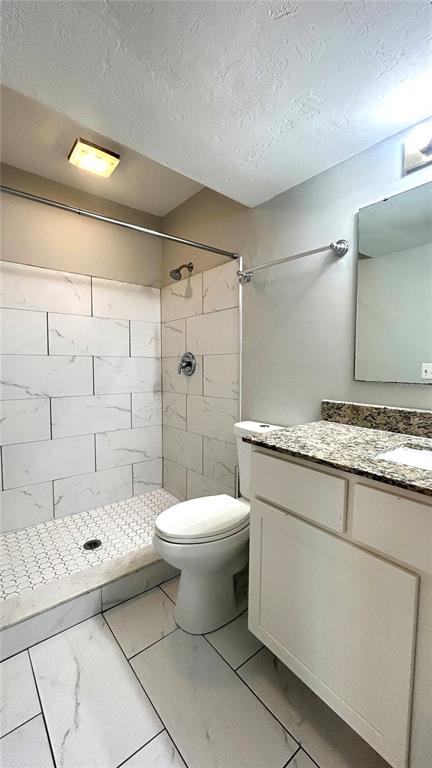 5324 Southwest 88 Court Gainesville, FL 32608 - Photo 15 of 21 a bathroom with a sink toilet and shower