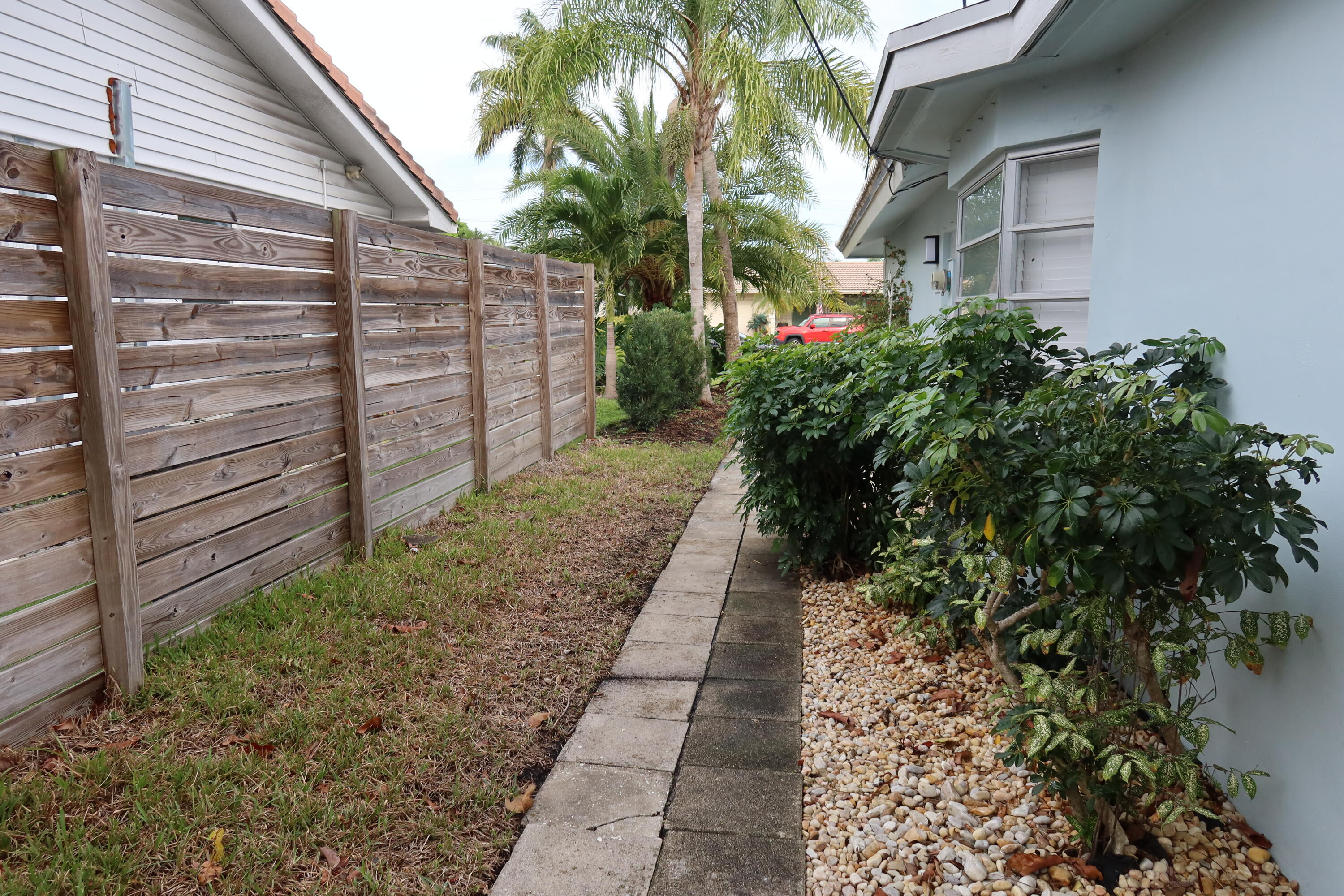 1001 Southwest 12th Terrace Boca Raton, FL 33486 - Photo 8 of 13 a backyard of a house with lots of green space