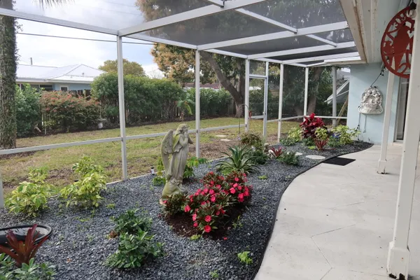 a view of a garden with patio