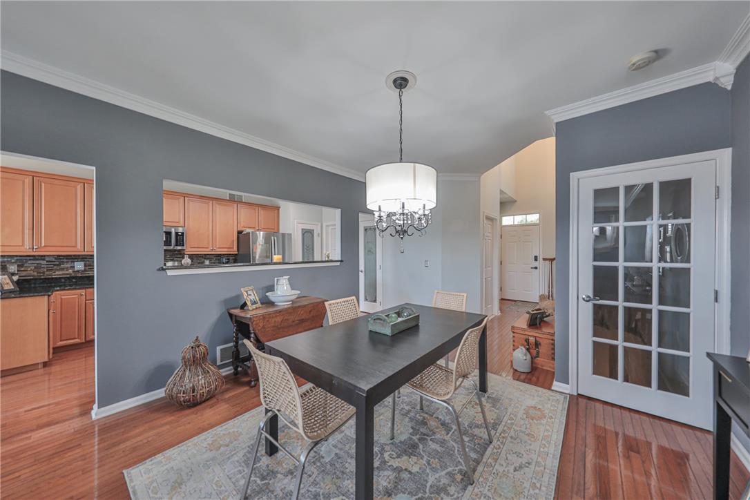 163 Muirfield Way Easton, PA 18042 - Photo 6 of 48 a view of a dining room with furniture window and wooden floor