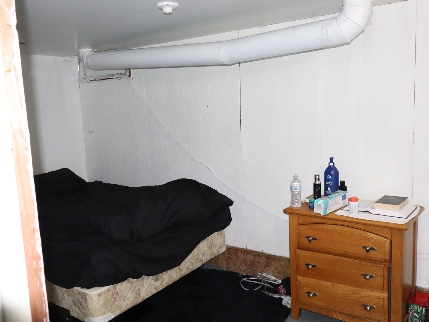 906 South Monroe Street Streator, IL 61364 - Photo 26 of 30 a bedroom with a bed and cabinets