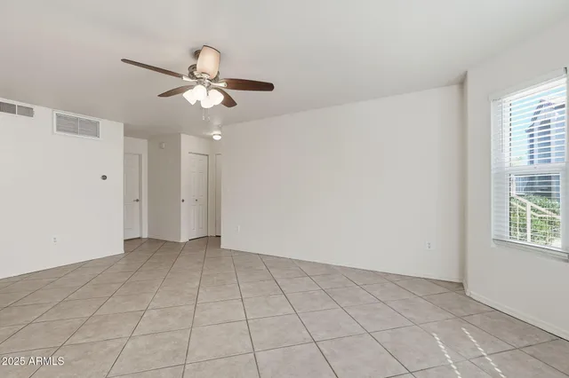 a view of livingroom with windows