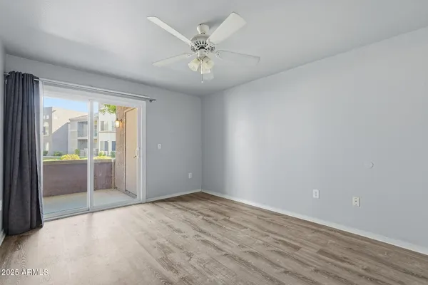 a kitchen with stainless steel appliances granite countertop a refrigerator and a stove