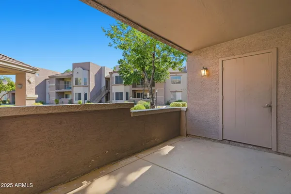 a bathroom with a shower and vanity