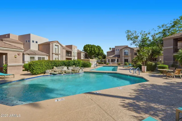 a view of an house with backyard porch and patio