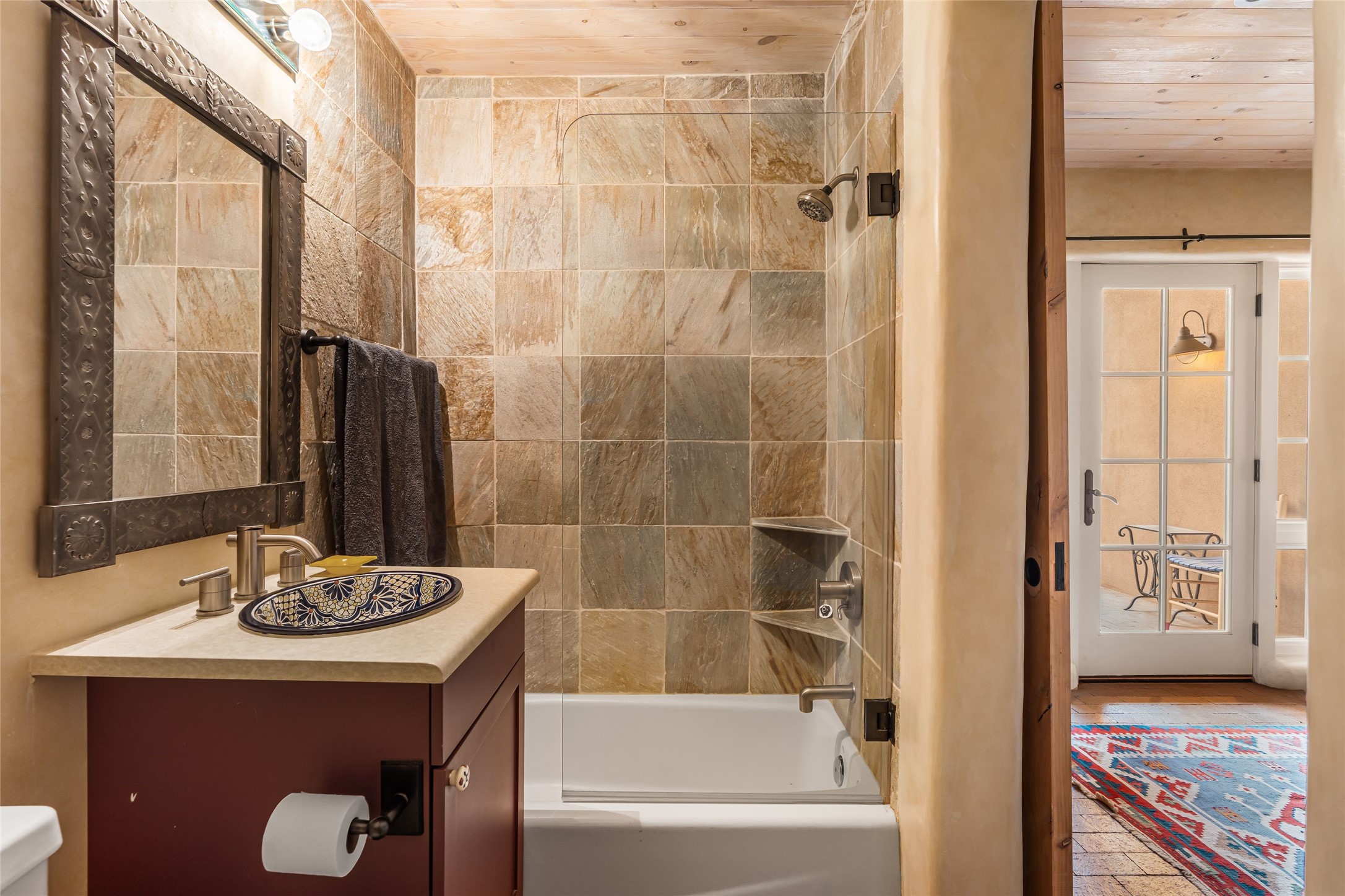 1 Cerro Gordo Road, Unit B Santa Fe, NM 87501 - Photo 20 of 25 Travertine marble second bath.