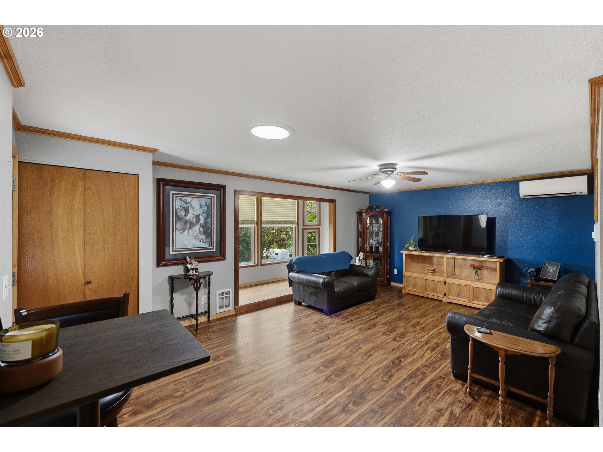 192 North Wood Ridge Road Coquille, OR 97423 - Photo 6 of 42 a living room with furniture and a flat screen tv