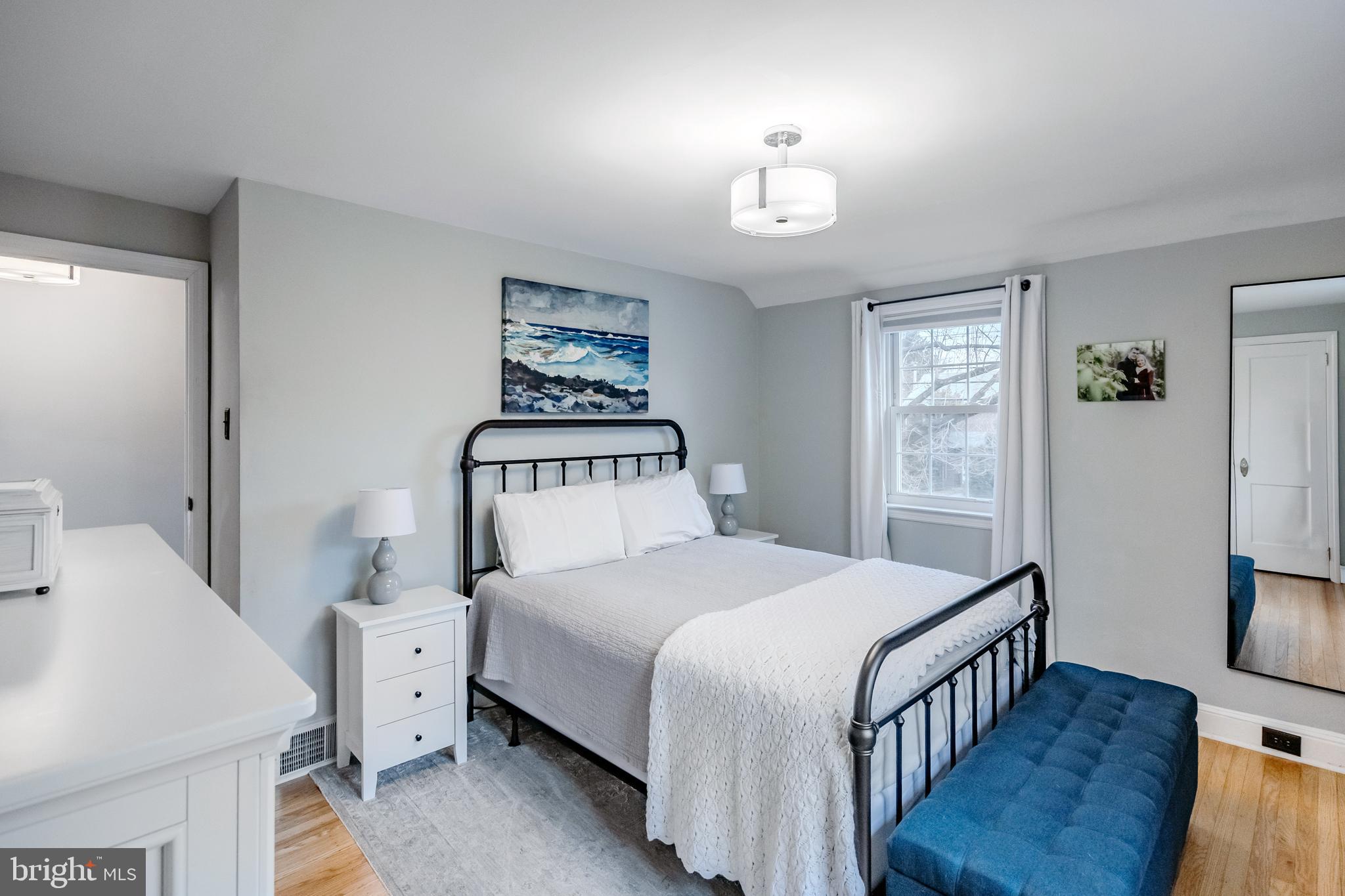 216 Earlington Road Havertown, PA 19083 - Photo 14 of 26 a bedroom with a bed and a table