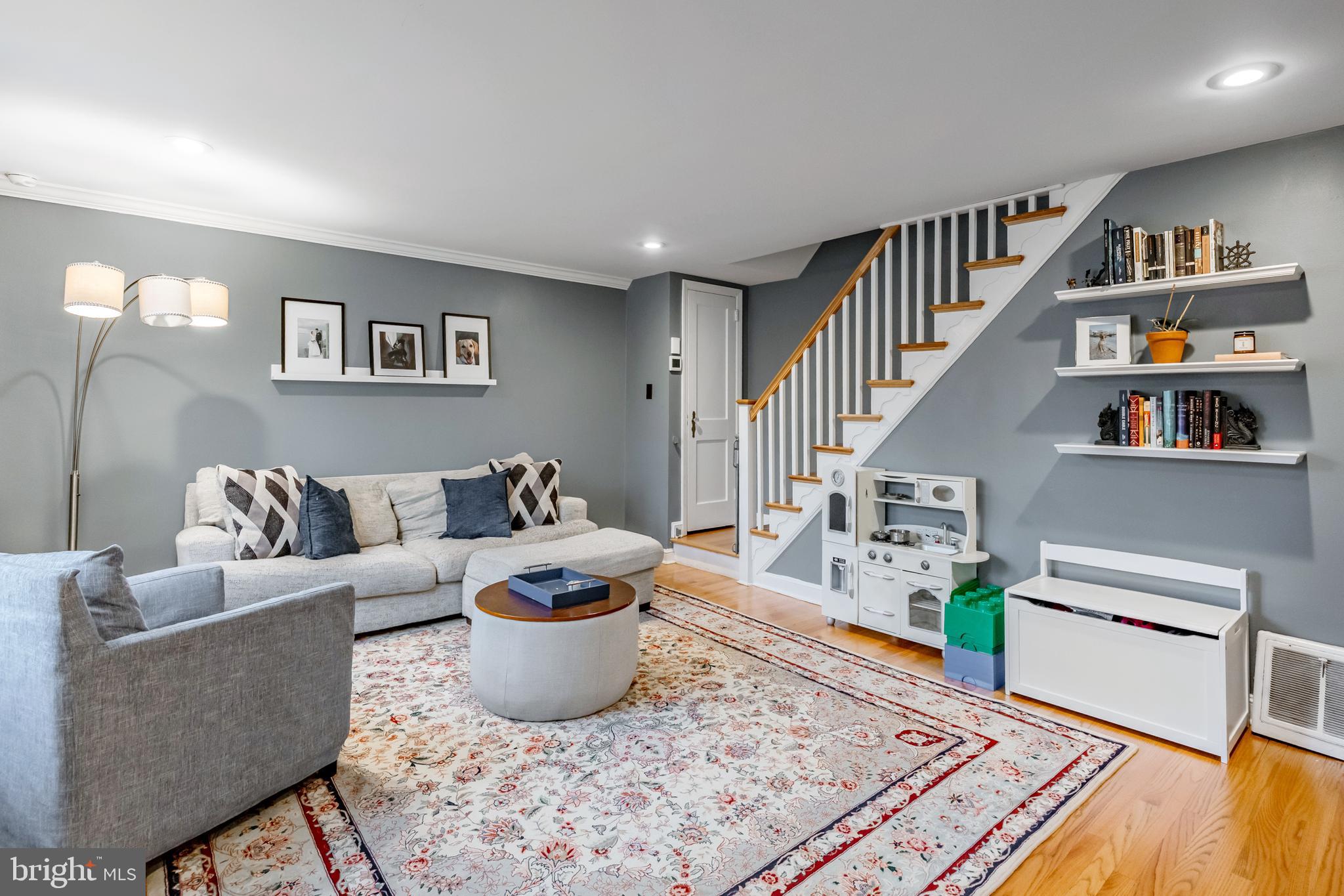216 Earlington Road Havertown, PA 19083 - Photo 4 of 26 a living room with furniture and a book shelf