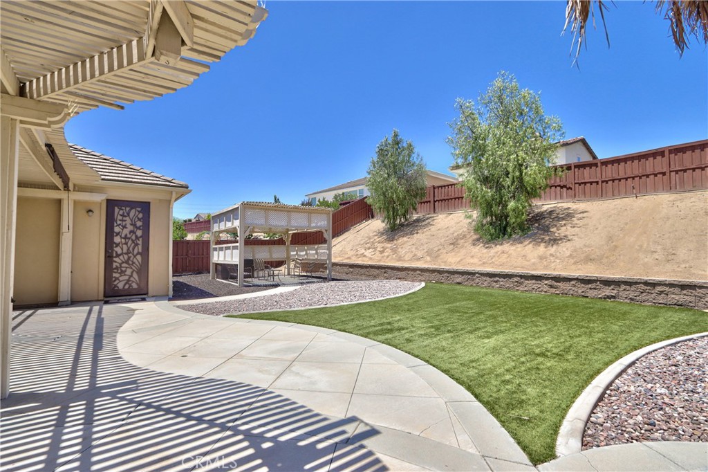 28483 Nautical Point Circle Menifee, CA 92585 - Photo 30 of 44 a view of a swimming pool with a patio