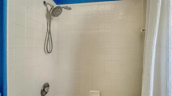 a view of a swimming pool with an outdoor space and seating area