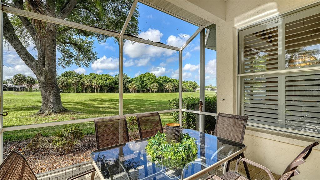 533 Fallbrook Drive Venice, FL 34292 - Photo 36 of 70 a view of a chair and table in the patio
