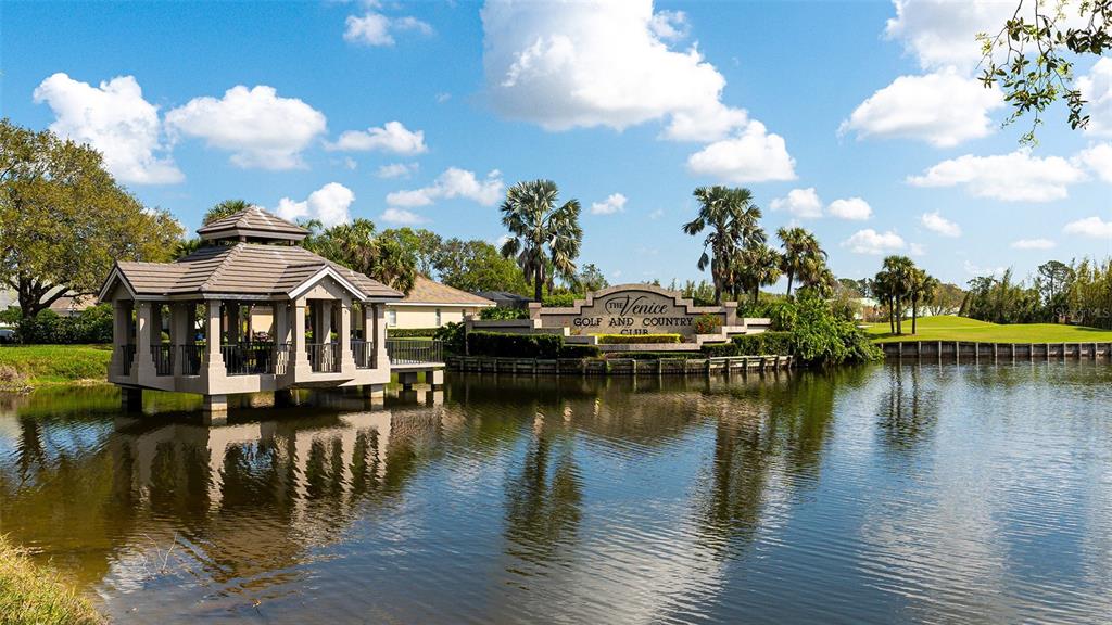 533 Fallbrook Drive Venice, FL 34292 - Photo 42 of 70 a view of a lake with boats and trees