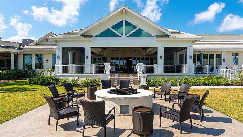 533 Fallbrook Drive Venice, FL 34292 - Photo 49 of 70 a view of a house with backyard sitting area and swimming pool
