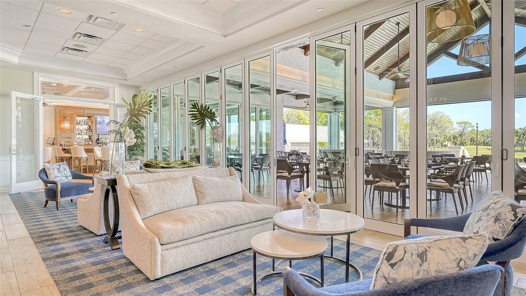 533 Fallbrook Drive Venice, FL 34292 - Photo 51 of 70 a living room with furniture and a large window