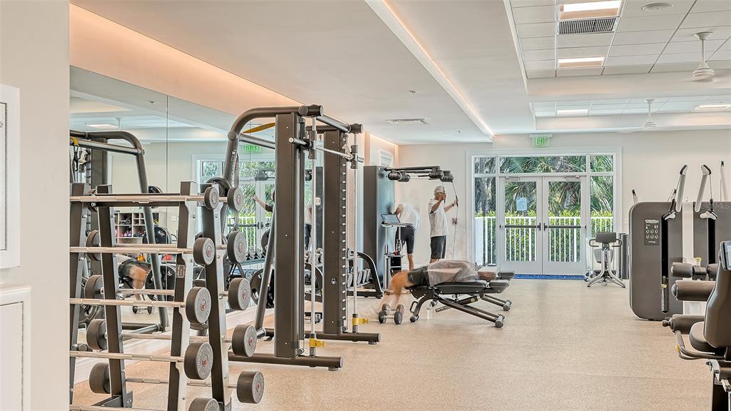 533 Fallbrook Drive Venice, FL 34292 - Photo 59 of 70 a view of a room with gym equipment