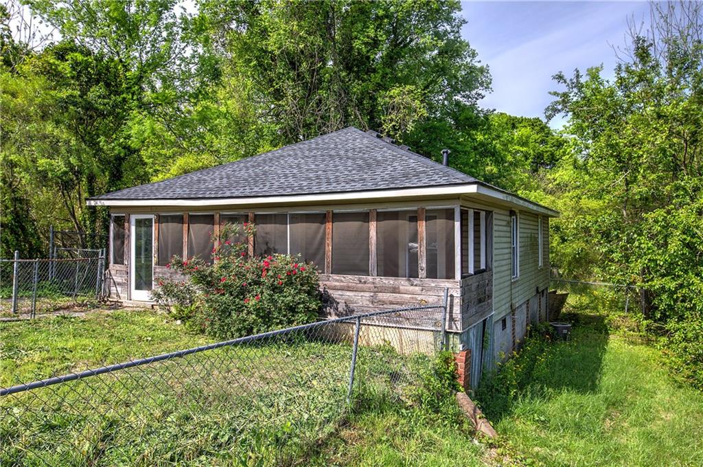 2014 Maple Avenue Southwest Rome, GA 30161 - Photo 22 of 22 a front view of house with yard and trees around
