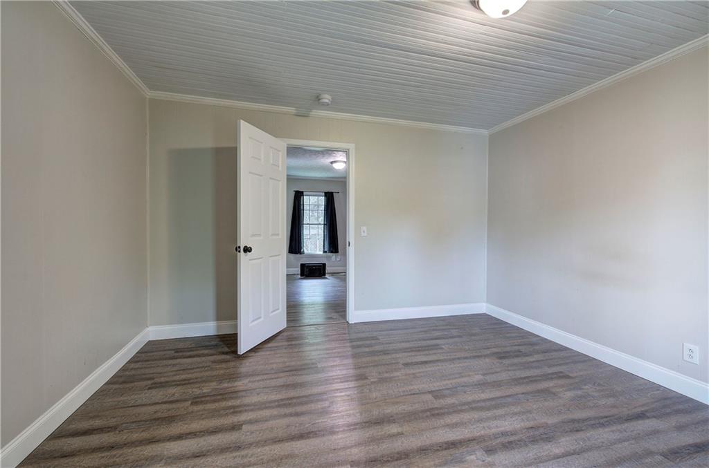 2014 Maple Avenue Southwest Rome, GA 30161 - Photo 7 of 22 a view of an empty room with wooden floor