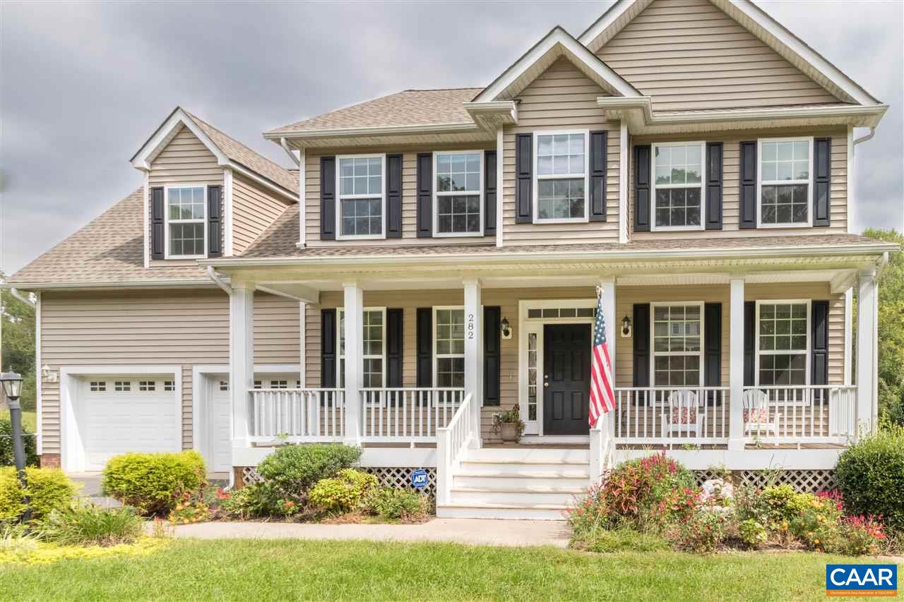 282 Lake Drive, Unit 2 Ruckersville, VA 22968 - Photo 2 of 27 front view of a house with a yard