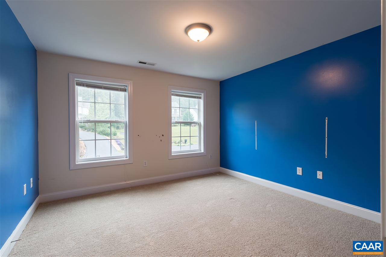 282 Lake Drive, Unit 2 Ruckersville, VA 22968 - Photo 23 of 27 an empty room with a window