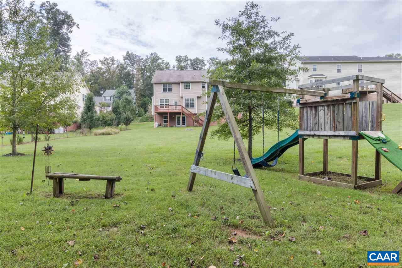 282 Lake Drive, Unit 2 Ruckersville, VA 22968 - Photo 25 of 27 a view of a park with swings