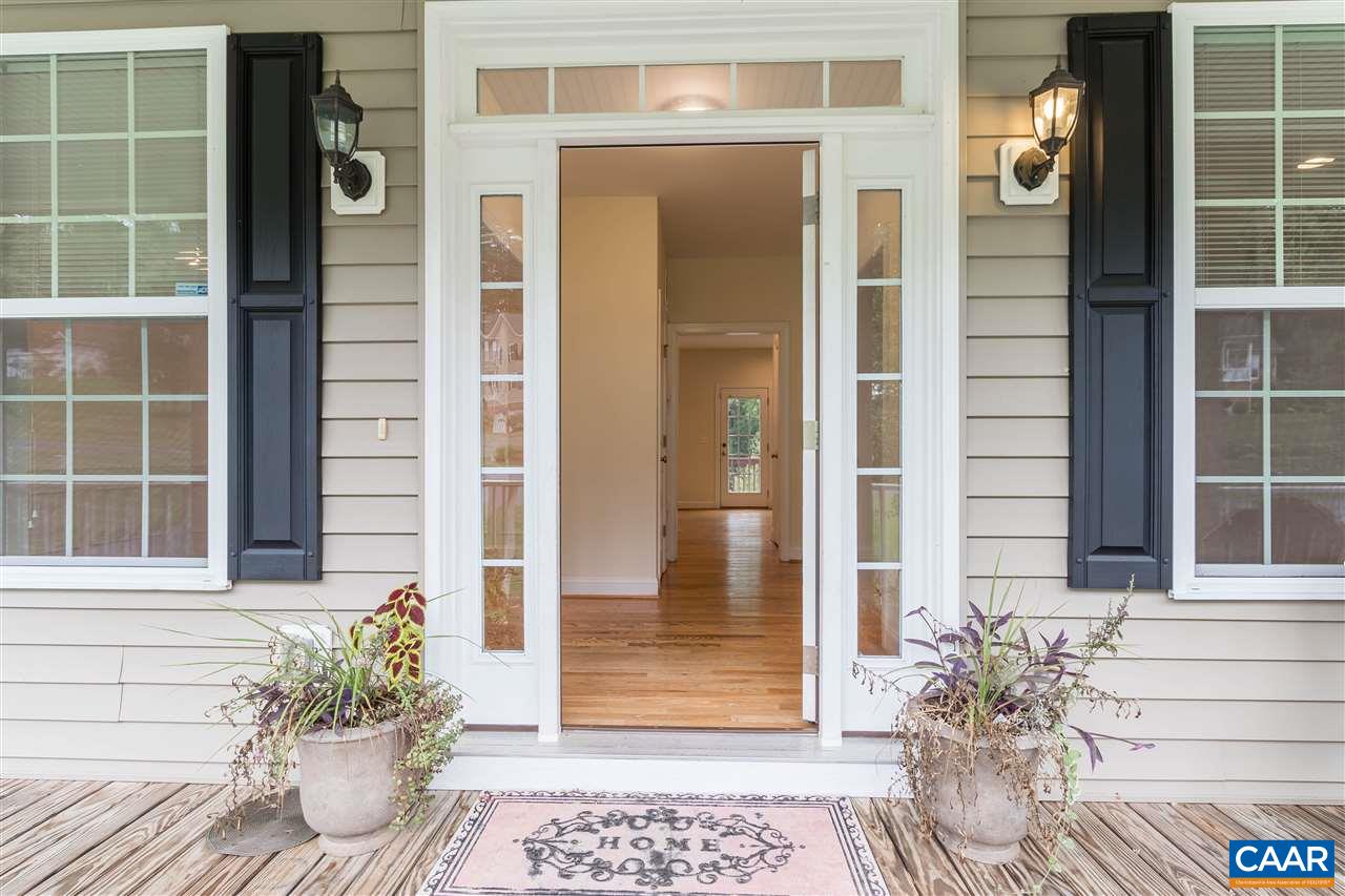 282 Lake Drive, Unit 2 Ruckersville, VA 22968 - Photo 3 of 27 a window with a potted plant in front of door