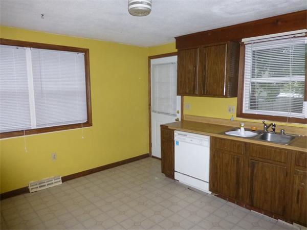 57-59 Howes Street Springfield, MA 01118 - Photo 5 of 14 a room with sink and window