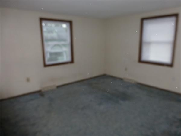 57-59 Howes Street Springfield, MA 01118 - Photo 10 of 14 an empty room with a window