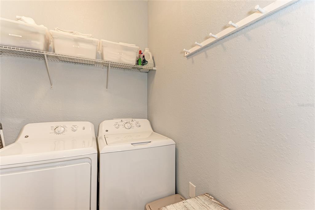 16804 Vardon Terrace, Unit 308 Bradenton, FL 34211 - Photo 30 of 43 a utility room with dryer and washer