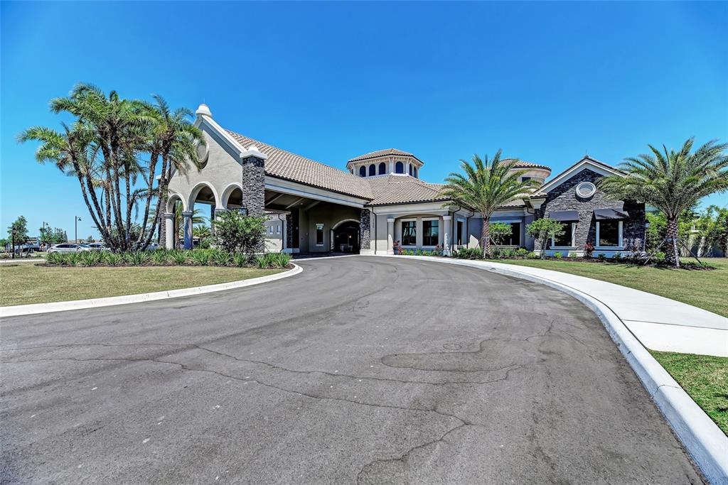 16804 Vardon Terrace, Unit 308 Bradenton, FL 34211 - Photo 36 of 43 a view of a building with a yard
