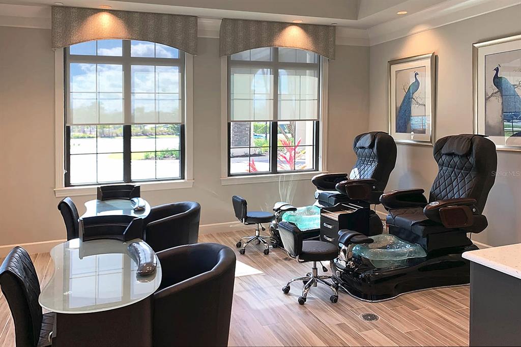 16804 Vardon Terrace, Unit 308 Bradenton, FL 34211 - Photo 43 of 43 a living room with furniture and wooden floor