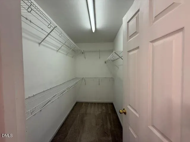 a view of a room with racks on the wall