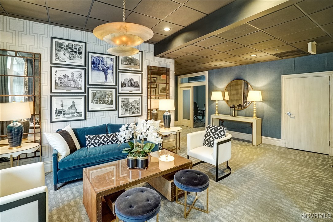 413 Stuart Circle, Unit 4C Richmond, VA 23220 - Photo 21 of 27 a living room with furniture and a large window