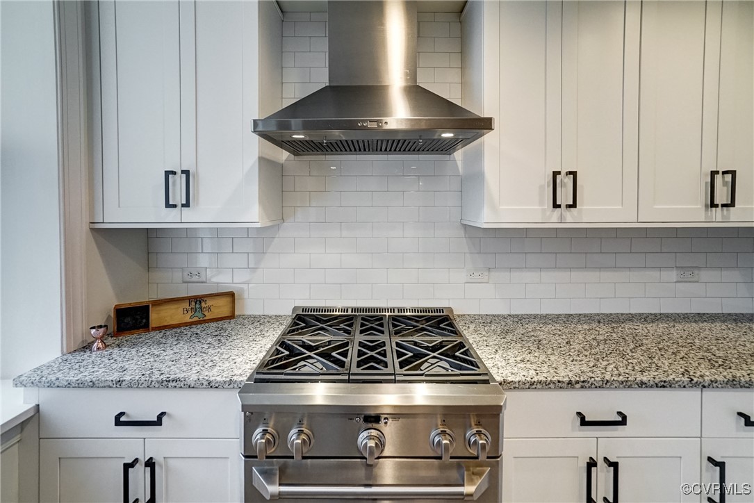 413 Stuart Circle, Unit 4C Richmond, VA 23220 - Photo 7 of 27 a stove top oven sitting inside of a kitchen