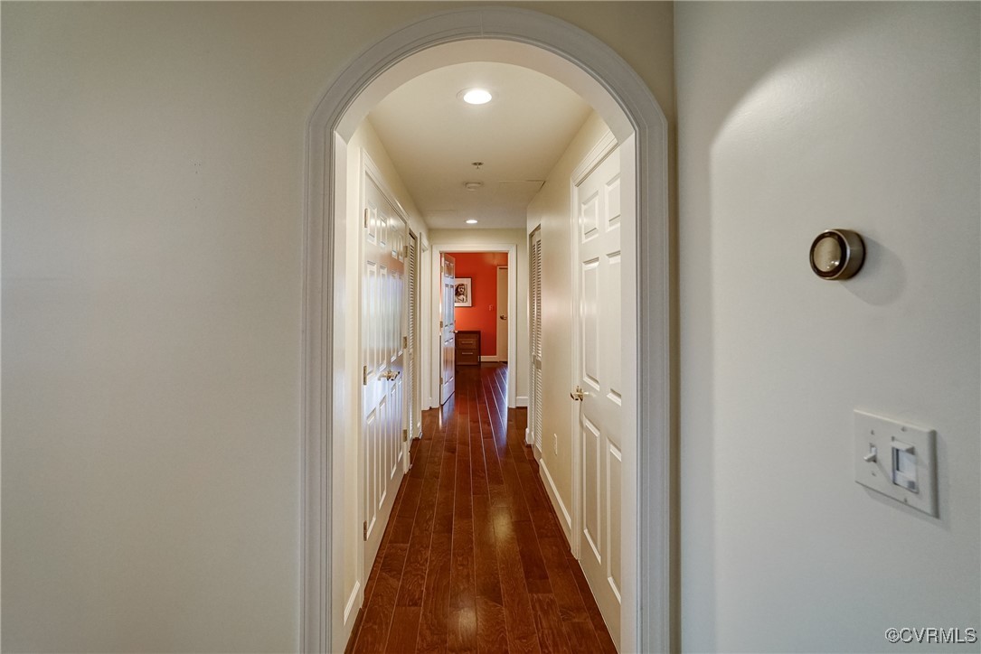 413 Stuart Circle, Unit 4C Richmond, VA 23220 - Photo 9 of 27 a view of a hallway with wooden floor