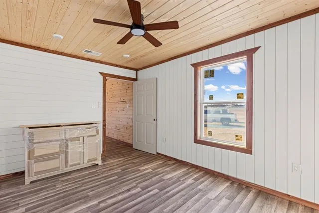 a view of a backyard of the house