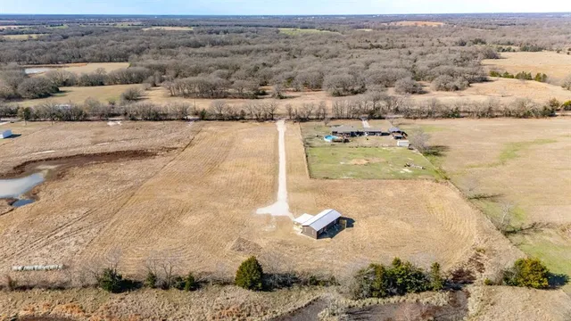 an aerial view of beach and ocean