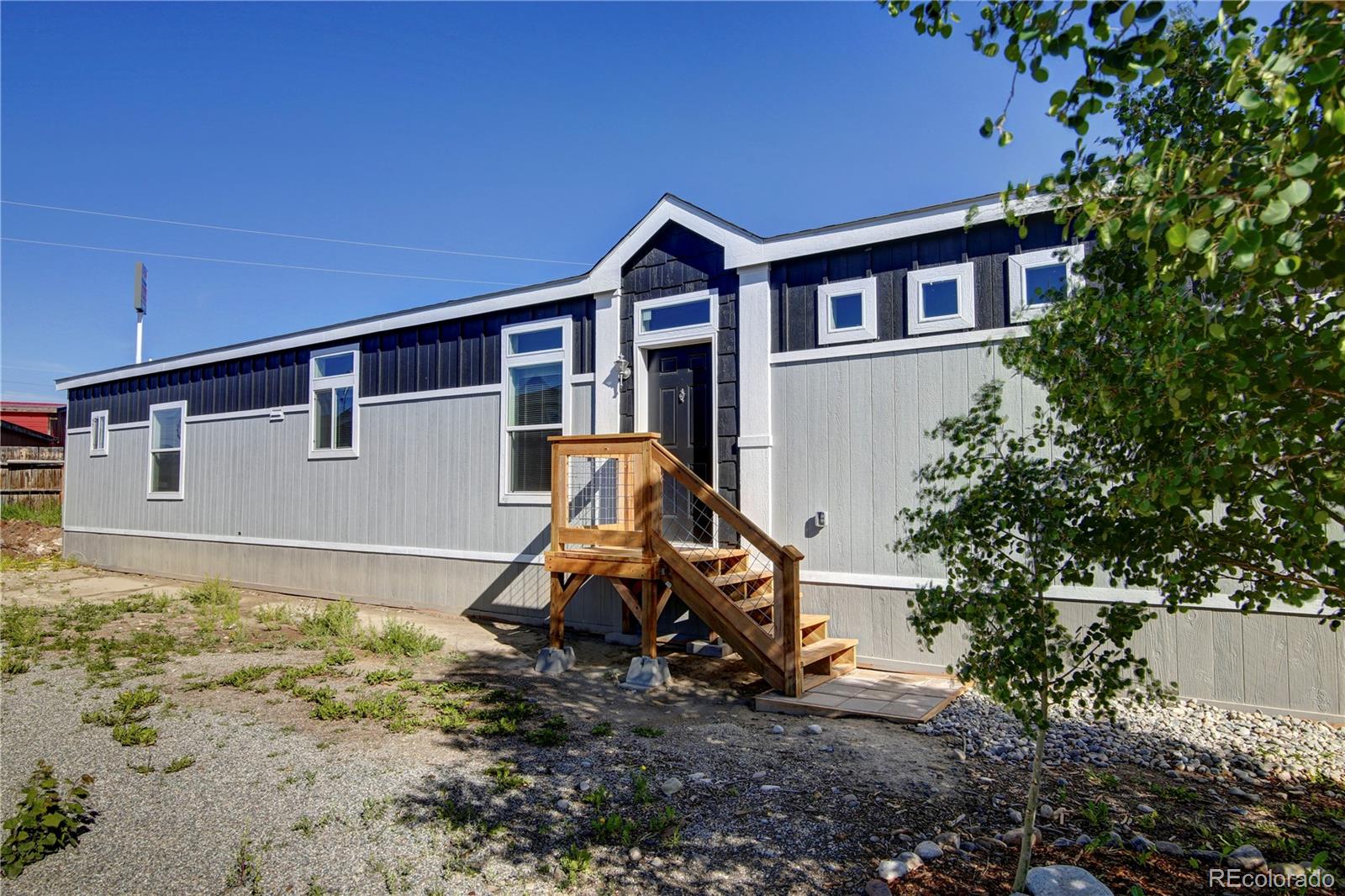 125 12th Street Fairplay, CO 80440 - Photo 15 of 17 a backyard of a house with table and chairs