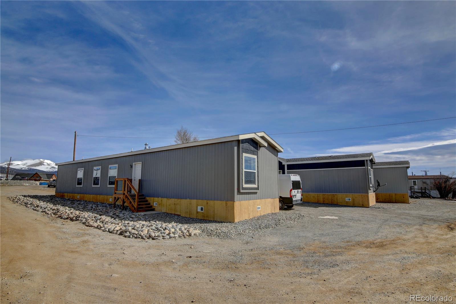 125 12th Street Fairplay, CO 80440 - Photo 16 of 17 a front view of a house with a yard